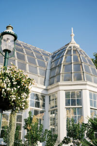Glass conservatory wedding venue in Columbus Ohio featuring classic greenhouse architecture and garden surroundings
