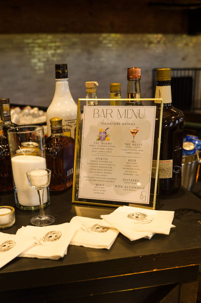 Custom wedding bar signage displaying signature cocktails at a luxury Columbus, Ohio wedding reception.